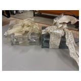 2 lighted glass Christmas boxes.