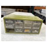 Vintage plastic storage cabinet with contents