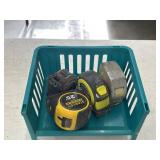 Bundle of tape measures.