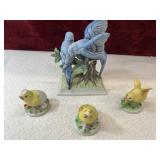 Porcelain Parakeets and chick figurines.