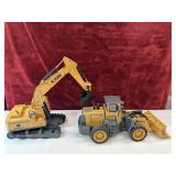 Used excavator and front loader toys.