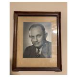 Framed black-and-white portrait of an individual