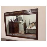 Vintage traditional wooden wall mirror.