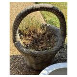 Concrete basket shaped planter.