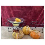 Metal scroll-accented gazing ball and plant stand