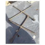 Two 4-way cross lug wrenches.