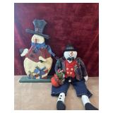 Handcrafted wooden folk art snowman figure and