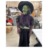 Life size animated Halloween witch prop.