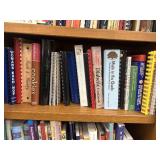 various cookbooks and recipe binders, Woman