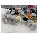 Large crate full of coffee cups from different