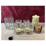 Bundle of candle holders and candles.
