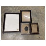 Assorted mix of picture frames.