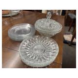 Stack of clear cut glass accent plates, stack of