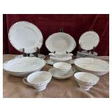 Modern China "Heirloom 2 plates. 10 saucers, 2