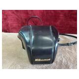 Vintage Nikon Nikomat camera with black leather