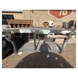 Large, custom-built wooden workbench.