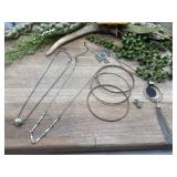 Costum jewelry. Collection of silver-toned