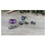 Assortment of fashion jewelry including rings and