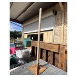 Hand dirt/soil tamper with a square cast-iron