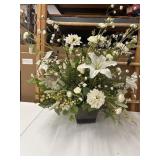 Elegant white floral arrangement in a square