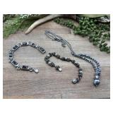 Stylish silver-tone jewelry pieces feature an