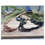 Vintage multi-strand black faceted glass bead