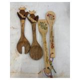 Vintage hand-carved wooden salad servers feature