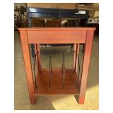 Wooden record player stand with a reddish-brown