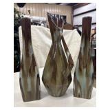 Set of three vintage ceramic vases.