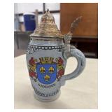 Vintage ceramic German beer stein featuring the