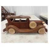 Handcrafted, vintage-style wooden model car built