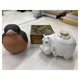 White ceramic trinket box shaped like a resting