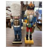 2 Decorative wooden nutcracker figures.