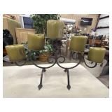 Wrought iron multi-pillar candelabra featuring