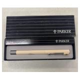 Beige Parker Vector pen with chrome trim,