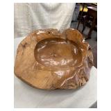 Hand-carved organic teak wood bowl.