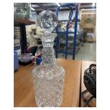 Clear, vintage cut-glass  liquor decanter with a