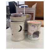 Cream-colored VP Home ceramic fragrance warmer,