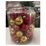 Clear storage jar filled with an assortment of