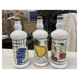 3 Vintage, hand-painted ceramic wine bottles