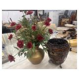 Faux red rose floral arrangement displayed in a