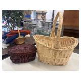 Handwoven wicker storage and gathering baskets.