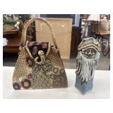 Handcrafted ceramic handbag sculpture by artist