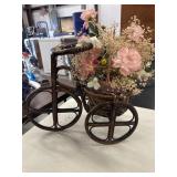 Vintage bamboo and rattan tricycle plant stand.