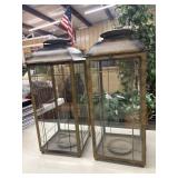 2 Decorative metal and glass candle lanterns.