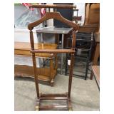 Traditional wooden valet stand.