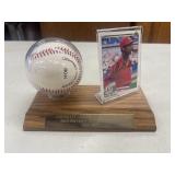 An autographed Willie McGee baseball card and a