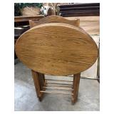 Set of wooden folding TV tray tables with oval