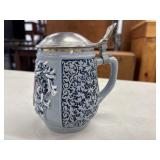 Vintage German stoneware beer stein featuring the