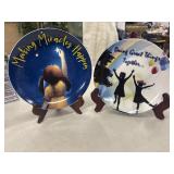 2 Decorative ceramic display plates.